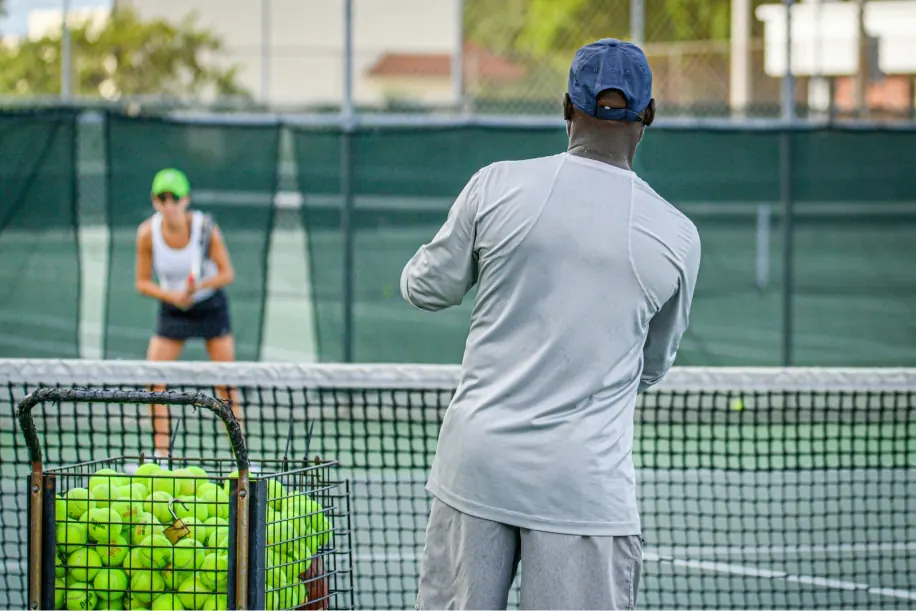 Tennis coach preparing for lessons
